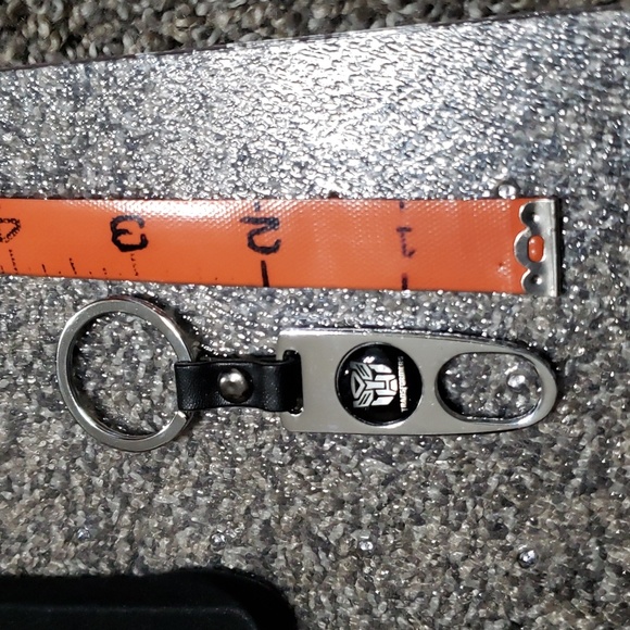 Transformers Autobot Keychain, Tire Valve Covers, Hubcap Decals, and Hood Decal - Picture 8 of 9
